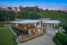  14 Jacklyn Close Boambee NSW 2450 $1,750,000 - $1,800,000 Nestled amidst the picturesque Boambee Valley with sweeping views extending to the Pacific Ocean, this exquisite family home seamlessly blends contemporary luxury with the allure of nature. Prestigiously crafted by the builder as his own home, it was built with meticulous attention to detail, featuring high-quality fittings and fixtures with a contemporary design that will leave you speechless. This home epitomizes elegance, comfort and modern family living. From every angle of the home, you are greeted with stunning valley views and ocean glimpses, creating a serene ambiance that encapsulates the beauty of nature from every part of the home. This expansive 367m² property offers abundant living areas and versatile work-from-home opportunities. Currently configured as a hair salon, the spacious downstairs area seamlessly transforms into a dynamic work-from-home environment. don't miss this once in a lifetime opportunity to own this grand modern family home. • Elevated positioning to capture panoramic vistas and a coveted north-facing orientation. • Spacious four-bedroom layout offering privacy and adaptability for families. • Effortless flow from the open-plan living, dining, and kitchen area to the covered deck. • King-sized bedrooms, including a master suite with an en-suite, WIR, and private deck. • Three modern bathrooms exuding convenience and luxury. • Ample parking space for seven vehicles or a caravan/boat in the expansive 84sqm shed. • Multiple living zones, including a generous media room. • Low-maintenance 3,000sqm block ensuring utmost privacy. • Superior craftsmanship and meticulous detailing throughout. • Prime Boambee locale offering tranquility and accessibility. • Just an 8-minute drive to Shopping Centres, beaches, and the Airport, combining serenity with convenience. • Ideal setup for home-based businesses. • Inclusion of a substantial 90,000L concrete water tank. 