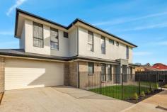  2C Thirza Ave Mitchell Park SA 5043 In a most convenient Mitchell Park position with its wide north-facing street frontage, this brand-new beauty is built for maximum lifestyle with minimal maintenance and a layout you'll love. An inviting formal entry gives way to a highly-sought ground floor master suite, complete with walk-in robe and luxurious ensuite bathroom with neutral full-height tiling and shower niche. Adjacent, a comfortable separate formal lounge, also enjoys that northerly aspect natural light and street outlook. Large format tiles line an elegant kitchen and dining space, where sleek cabinetry, a gas cooktop, dishwasher, most convenient butler's pantry, double sink and pendant lighting over a lengthy breakfast bar make for happy home cooking. Upstairs, a further three bedrooms include a superb alternate master option with mirrored built-ins and an ensuite bathroom, while bedrooms two and three – each with robes – are serviced by a main family bathroom with bath, shower and separate w/c. An upstairs home theatre room will make for memorable movie nights, while adding a welcome second living space or the flexibility of an additional bedroom if required. Under the protection of the main roof, an alfresco entertaining space overlooks a secure courtyard with lawn strip, while a fully fenced front yard provides extra legroom for little legs or furry friends. More you'll adore: - Generous upstairs study nook perfect for a home office setup without compromising a bedroom - Ducted reverse cycle air conditioning throughout - Under stair store room - Double garage with drive-through & internal access + extra driveway parking - Ground floor separate laundry + fourth w/c Convenient to local schools, reserves and bus and train transport and the revamped Marion Hotel & Cellars, you'll find the Park Holme Shopping Centre and local schooling options within easy walking distance, as well as easy access to Westfield Marion, city and sea. Family sized with true flexibility; this one is certain to be an instant favourite. 
