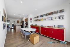  105/1 Rowland Rees Crescent Greenway ACT 2900 $780,000 Nestled in a secure complex, this stunning, thoughtfully designed three-bedroom townhouse combines comfort, style and impressive savings. Equipped with a 10KW solar system and battery, this eco-conscious feature helps lower energy costs while supporting a more sustainable lifestyle. Upon arrival, you’ll be greeted by a private, sun-drenched north-facing courtyard, featuring an American-made Hotspring Jetsetter Spa, offering the ultimate outdoor experience. This inviting space also includes an automatic retractable Sundream awning, ensuring privacy and comfort on hot days. The bi-fold doors and retractable flyscreen create a seamless connection to the indoor living areas while maximizing cross-ventilation throughout the home. If you’re seeking the perfect indoor/outdoor lifestyle for relaxation and entertaining, this is the place to call home! The oversized double garage is custom-fitted as a home gym, complete with quality wall art, rubber tiles, two oakwood lifting platforms, and rogue wall-mounted gym equipment—ideally sold with the property. It’s the perfect space for fitness enthusiasts or those looking to run a personal training business from home. After a workout, unwind in the spa—truly a lifestyle to enjoy, all under one roof! The home features two separate living areas and a modern kitchen at the heart of the space, providing ample room for family and guests. Natural light floods the home, enhanced by a separate internal courtyard that ensures cross-ventilation, making the home feel open and airy. The master bedroom is conveniently located on the ground floor and includes a walk-in robe, ensuite, and built-in dresser for maximum storage. Upstairs, you’ll find two additional bedrooms and a rumpus room for extra family living. Just a short 7-minute walk to Pine Island Reserve and a 10-minute walk to SouthPoint Shopping Centre, you’ll be surrounded by nature and just moments from shops, restaurants, public transport, and all your daily amenities. Beyond your private retreat, you’ll also have access to community facilities, including a BBQ area, solar-heated saltwater pool, outdoor gym, playground, and pool house. This is more than just a home – it’s a lifestyle choice. Whether you’re unwinding in the spa, staying active, or enjoying the outdoors, this townhouse is designed for a lifestyle of comfort, convenience, and leisure. Features: -North facing modern townhouse living -Beautifully presented- move in ready -Double garage with internal access, professionally custom fitted as a home gym (selective equipment/fixtures ideally to stay with property) -Three spacious bedrooms -Master bedroom includes built in dresser, walk-in robe and ensuite -Internal courtyard adjacent the laundry -Powder room on ground level -Functional kitchen with featuring double fridge, integrated dishwasher and pantry -Additional living space upstairs -Private alfresco deck with automatic Sundream retractable awning -American made 3-4 seater Jetsetter Spa featuring low running costs and a Ozone sanitising system -Retractable flyscreen and bifold doors connecting indoor/outdoor space -All TV’s and the fridge will stay -10KW Solar and Tesla Battery -Ducted reverse cycle heating and cooling throughout -Easy access to South.Point Tuggeranong, Coles Greenway, local parks like Lake Tuggeranong and Tuggeranong Hill Nature Reserve, and the Tuggeranong Interchange.. 