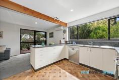  4 Cameron St Farrer ACT 2607 $1,320,000 Flexible viewing times – contact Natalie on 0405 313 901 to arrange a time to suit you. Bathed in natural light and brimming with character, this beautifully maintained mid-century Pettit and Sevitt masterpiece offers tranquility, style and functionality. Clerestory windows, skylights, exposed beams and parquetry flooring all create an inviting atmosphere, while the spacious single-level design effortlessly integrates indoor and outdoor spaces, offering a seamless connection to nature. Four well-sized bedrooms, each with a peaceful garden outlook, provide comfort for the whole family. In addition the stylish bathrooms enhance the home’s character. Outdoors, the manicured gardens offer a private sanctuary that complements the charm of this home. The impressive, low maintenance gardens have been thoughtfully designed by the owner, a horticulturist and professional landscaper, to provide the ideal retreat to entertain and relax. A sun-drenched front courtyard, framed by Gardenias and Magnolias, features stunning travertine pavers, perfect for enjoying your morning coffee amid lush greenery in a tranquil setting. At the rear, a covered alfresco deck area seamlessly extends from the living space, ideal for hosting guests while overlooking the beautiful backyard. The secure wrap around yard provides a safe space for children and pets, while two driveways offer ample room for a trailer, boat, or caravan. Plus, a herb garden runs along the side of the house—something for everyone to enjoy! Upon entering this secluded oasis you will immediately feel right at home! Positioned in a quiet, family-friendly neighbourhood, this unique home is just a short stroll from Farrer Shops, where you’ll find the local IGA and popular Fox and Bow Cafe. It’s also within walking distance to Farrer Primary School, parks, playgrounds and Farrer Ridge where you can enjoy scenic walking trails. Nearby, you’ll find local ovals, Southlands Shopping Centre and convenient transport links to ensure an easy commute to Woden, Tuggeranong and the City. Features: -Mid Century Pettit and Sevitt single level masterpiece -Positioned in tightly held street on a private block surrounded by charming gardens -Double garage with workshop space -Additional driveway providing space for a caravan, trailer and boat -Professionally landscaped, fully irrigated, low maintenance gardens -Front courtyard features LCD spotlights for evening entertainment -Sunny front courtyard featuring travertine pavers and established gardens -Light filled living enhanced by skylights, floor to ceiling and clerestory windows -Separate family room with new double glazed doors -Classic Parquetry flooring and new carpet through hub of the home -Exposed timber beams -Spacious kitchen with ample storage, bench space, dishwasher and electric appliances -Four bedrooms all with built in robes, three overlooking a rock garden featuring rosemary, Azaleas -and Crepe Myrtles. -Master with ensuite and view over front courtyard. -Stylish mid century bathrooms -Renovated powder room -Private deck off living with insulated pergola overlooking gardens -Garden shed with power -Herb garden with sage, thyme, oregano, Thai and sweet basil -Walking distance to Farrer Shops, Farrer Primary School, Farrer Ridge, local playgrounds, ovals and Southlands Shopping Centre. 