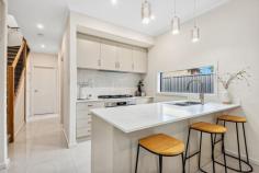  2C Thirza Ave Mitchell Park SA 5043 In a most convenient Mitchell Park position with its wide north-facing street frontage, this brand-new beauty is built for maximum lifestyle with minimal maintenance and a layout you'll love. An inviting formal entry gives way to a highly-sought ground floor master suite, complete with walk-in robe and luxurious ensuite bathroom with neutral full-height tiling and shower niche. Adjacent, a comfortable separate formal lounge, also enjoys that northerly aspect natural light and street outlook. Large format tiles line an elegant kitchen and dining space, where sleek cabinetry, a gas cooktop, dishwasher, most convenient butler's pantry, double sink and pendant lighting over a lengthy breakfast bar make for happy home cooking. Upstairs, a further three bedrooms include a superb alternate master option with mirrored built-ins and an ensuite bathroom, while bedrooms two and three – each with robes – are serviced by a main family bathroom with bath, shower and separate w/c. An upstairs home theatre room will make for memorable movie nights, while adding a welcome second living space or the flexibility of an additional bedroom if required. Under the protection of the main roof, an alfresco entertaining space overlooks a secure courtyard with lawn strip, while a fully fenced front yard provides extra legroom for little legs or furry friends. More you'll adore: - Generous upstairs study nook perfect for a home office setup without compromising a bedroom - Ducted reverse cycle air conditioning throughout - Under stair store room - Double garage with drive-through & internal access + extra driveway parking - Ground floor separate laundry + fourth w/c Convenient to local schools, reserves and bus and train transport and the revamped Marion Hotel & Cellars, you'll find the Park Holme Shopping Centre and local schooling options within easy walking distance, as well as easy access to Westfield Marion, city and sea. Family sized with true flexibility; this one is certain to be an instant favourite. 
