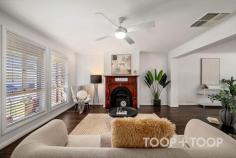  13 Gelland Pl West Croydon SA 5008 $849,000 Situated at 13 Gelland Place, West Croydon, this three-bedroom residence blends contemporary design with practical living. Just eight kilometres from the CBD, it offers easy access to city life while maintaining an air of tranquillity. The heart of the home is its open-plan living area, tailor-made for relaxation and socializing. Filled with natural light, this space seamlessly flows into an outdoor entertaining area, complete with automatic outdoor blinds, perfect for gatherings in any season. The primary suite adds a touch of luxury, featuring private access to a rear deck, ideal for leisurely mornings or peaceful evenings. Features We Love: - Three spacious bedrooms - Two bathrooms - Open-plan living area with smooth indoor-outdoor flow - Primary suite with private deck access - Evaporative cooling and gas heating, including a cozy fireplace, for year-round comfort - Solar panels and a 1000L rainwater tank promoting sustainability - Proximity to the vibrant Queen Street café strip - Several schools a short stroll away Highlighted by thoughtful amenities, the property ensures convenience and security with roller shutters on all windows and doors, a triple lock screen door, and a ducted vacuum system. With climate control features like evaporative cooling, a gas wall heater, and a gas fireplace, the home remains comfortably inviting year-round. Eco-conscious elements such as solar panels and a substantial rainwater tank underscore its sustainable living credentials. This prized location offers easy access to the lively Queen Street café strip and several local schools, enhancing this urban retreat's allure. In summary, 13 Gelland Place promises sophisticated living within a desirable suburban setting. Its blend of modern amenities, security features, and strategic location makes it an exceptional choice for those seeking a refined, city-adjacent lifestyle. 