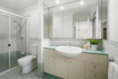  8/47 Indooroopilly Road Taringa QLD 4068 Welcome to Residence 8 at Sovereign Rise, a stunning townhome located in one of Taringa's most sought-after locales. Quietly positioned on a tree-lined NE facing ridge, the beautifully appointed residence takes advantage of its perfect NE aspect capturing summer breezes and a vista to the city skyline. Located in a secure gated complex of 11 boutique residences, the two-level home features a generously proportioned lounge and dining room opening to a deep outdoor patio and gated garden courtyard. The location is adjacent to local parklands and a short distance to Toowong Village and some of Brisbane's best schools. This residence is perfect for those looking for a comfortable family home with the convenience of low maintenance, near city living. Vacant possession is available to the successful buyer. Streamlined galley-style kitchen with inlaid stone bench tops & generous pantry storage King-sized main bedroom with private NE patio, walk-in robe and large ensuite Two additional queen-sized bedrooms with great robe space, ideal for teenagers & home office Quality natural timber parquetry flooring and superb 2.7m ceiling height Convenient direct level access from the large remote-controlled double garage Excellent storage including loft storage in the garage and deep linen & utility cupboards Complex positioned on sprawling 3,357m2 land parcel not impacted by flooding in 2011 and 2022. 