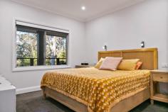  33 Seventh Avenue Katoomba NSW 2780 $1,100,000 - $1,200,000 Set in a quiet street, this recently renovated, north-facing family home offers comfort, style, and opportunity. The first floor is thoughtfully designed for family living, while the large downstairs studio adds flexibility for modern lifestyles with the potential for Airbnb, intergenerational living, or a studio workspace. The expansive block features a bush outlook that ensures tranquility and privacy and is a short walk to the spectacular Minnehaha Falls. Key Features: • Spacious Living: The 3-bedroom, 2-bathroom first floor boasts a seamless blend of style and functionality. The large, north-facing deck invites alfresco dining, where you can relax and soak in the peaceful surroundings. • Modern Comforts: Enjoy an updated kitchen, bathroom, and ensuite, along with built-in robes (including a master bedroom with a walk-in robe). Contemporary floorboards, gas heating, and a security camera system ensure comfort all year round. • Versatile Floorplan: The additional downstairs studio, kitchenette and bathroom, with separate external access, make it ideal for a home business, intergenerational living, or Airbnb income potential. • Ample Storage: A double lock-up garage with 3 phase power supply, and an additional workshop provide generous space for storage or hobbies. • Idyllic Setting: Situated on a 2,605sqm tranquil block that borders Yosemite Creek, this location offers a serene backdrop to everyday life. Whether you're a growing family, a savvy investor, or someone seeking a peaceful retreat, this home checks all the boxes. 