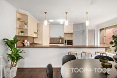  13 Gelland Pl West Croydon SA 5008 $849,000 Situated at 13 Gelland Place, West Croydon, this three-bedroom residence blends contemporary design with practical living. Just eight kilometres from the CBD, it offers easy access to city life while maintaining an air of tranquillity. The heart of the home is its open-plan living area, tailor-made for relaxation and socializing. Filled with natural light, this space seamlessly flows into an outdoor entertaining area, complete with automatic outdoor blinds, perfect for gatherings in any season. The primary suite adds a touch of luxury, featuring private access to a rear deck, ideal for leisurely mornings or peaceful evenings. Features We Love: - Three spacious bedrooms - Two bathrooms - Open-plan living area with smooth indoor-outdoor flow - Primary suite with private deck access - Evaporative cooling and gas heating, including a cozy fireplace, for year-round comfort - Solar panels and a 1000L rainwater tank promoting sustainability - Proximity to the vibrant Queen Street café strip - Several schools a short stroll away Highlighted by thoughtful amenities, the property ensures convenience and security with roller shutters on all windows and doors, a triple lock screen door, and a ducted vacuum system. With climate control features like evaporative cooling, a gas wall heater, and a gas fireplace, the home remains comfortably inviting year-round. Eco-conscious elements such as solar panels and a substantial rainwater tank underscore its sustainable living credentials. This prized location offers easy access to the lively Queen Street café strip and several local schools, enhancing this urban retreat's allure. In summary, 13 Gelland Place promises sophisticated living within a desirable suburban setting. Its blend of modern amenities, security features, and strategic location makes it an exceptional choice for those seeking a refined, city-adjacent lifestyle. 