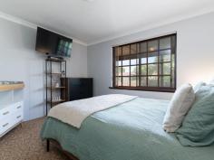  32 Bedingfeld Rd Greenfields WA 6210 $929,950 This expansive 1,403m² lifestyle property is your gateway to the perfect blend of space, comfort, and endless potential! Located in the sought-after suburb of Greenfields, you’ll enjoy peaceful country-style living while staying just minutes from Mandurah’s best shopping, schools, parks, medical facilities, and transport links. With a recent refresh, this home is ready for you to make new memories! At the heart of this home is a versatile layout ideal for large families or multi-generational living. The original section boasts a spacious lounge, a modern renovated kitchen, and a dining area that flows effortlessly onto the huge rear patio—perfect for year-round entertaining. Three well-sized bedrooms, a family bathroom, and newly serviced ducted evaporative air-conditioning complete this side of the home. But wait, there’s more! A separate living wing with its own kitchen, dining, and lounge area leads to a private master suite with built-in mirrored robes and an oversized en-suite. This self-contained space—featuring independent front and rear access plus reverse-cycle air conditioning—is perfect for extended family, a granny flat, or even rental income!  Outdoor lovers, take note! The gardener’s paradise includes lush lawns, bore-reticulated garden beds, and plenty of room for a veggie patch, chicken coop, or even a pool!  THE ULTIMATE WORKSHOP: The 12m x 7m powered workshop is a dream come true for tradies or hobbyists, featuring double sliding doors, an overhead gantry, a winch, and a fully lit mechanic’s pit! Why Greenfields? Family-friendly community with parks, walking trails & nature reserves Close to major shopping centres, schools, and medical facilities Easy access to Mandurah Forum, train station & freeway Moments from the Serpentine River & beautiful Mandurah waterways Additional Features: Solar panels to help slash your energy bills Private, shaded front garden for added seclusion Side access with double gates—room for boats, caravans & trailers This one-of-a-kind property offers unbeatable value and is ready for its new owners! Call Zaia on 0403577294 today to book your private viewing! 