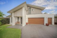  25 Angophora Dr Pokolbin NSW 2320 $1,575,000 Positioned in the heart of The Vintage, Pokolbin – one of the Hunter Valley’s most exclusive residential and golfing precincts – 25 Angophora Drive is a rare opportunity to secure a slice of luxury within a world-class lifestyle destination. Surrounded by award-winning wineries, fine dining, and the renowned Vintage Golf Club, this prestige home offers the perfect blend of sophistication, space, and serenity. Designed for effortless entertaining and relaxed family living, this expansive residence is set on a beautifully landscaped block with spectacular views of the 3rd green. Whether you’re an avid golfer, a weekend entertainer, or simply chasing a lifestyle change, this one has it all. • Spacious Theatre room split system air-conditioning – perfect for movie nights or game days • Light-filled main living area with louvre windows and a striking river rock gas fireplace • Downstairs guest bedroom with walk-in robe and ceiling fan – ideal for visiting family or multi-generational living • Gourmet open-plan kitchen and dining area featuring: • Expansive Granite Island bench (3m x 1.2m) • 900mm gas cooktop & electric oven with a captivating Crocodile print splashback • Servery window connecting to outdoor entertaining • Ample storage for the home chef • Main bathroom with spa bath, shower, toilet, and double vanity • Separate downstairs bathroom with 2m vanity, shower, and separate toilet • Main bedroom sanctuary with two walk-in robes and a large private ensuite • Large Master Ensuite • Additional bedrooms all with ceiling fans and built-in robes • Spacious laundry with ample storage and access to a private courtyard • Expansive covered outdoor entertaining area overlooking the golf course and surrounded by lush Australian natives • All lawns and gardens are hydrated by a irrigation system • Beautifully maintained brush box hardwood timber flooring, louvre windows and ducted air-conditioning throughout • Double garage plus separate golf cart space with a dedicated workshop area Don’t Miss This Opportunity! Live every day like you’re on holiday in one of the Hunter Valley’s most sought-after communities. Whether you’re retiring in style, seeking a weekend escape, or investing in lifestyle, 25 Angophora Drive is ready to welcome you home. BOOK YOUR INSPECTION TODAY!! 