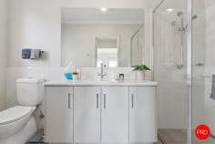  4 Cumberland Terrace Strathfieldsaye VIC 3551 $720,000 - $750,000 Nestled in one of Bendigo's most sought-after neighbourhoods, 4 Cumberland Terrace, Strathfieldsaye, is a stunning home that presents as new. Designed with family living in mind, this beautifully crafted brick residence boasts an expansive floorplan, oversized bedrooms, and multiple living areas, making it the perfect retreat for modern living. The home features four generous bedrooms, 3 with built in robes and the master has a large walk-in robe and private ensuite. A dedicated study offers flexibility for those working from home and could also serve as a third living space, complementing the two existing living areas. The spacious open-plan design flows seamlessly to an inviting alfresco, making it ideal for year-round entertaining. The well-appointed kitchen is equipped with an induction cooktop, electric oven, and a gas hot water system, ensuring convenience and efficiency. Ducted & zoned Daikin reverse cycle heating and cooling provide year-round comfort, while security lights and a double lock-up garage with remote entry, house access, and a rear roller door add practicality and peace of mind. Outdoors, the property continues to impress with a large, secure yard, established lawns, stone pathways, and beautifully maintained garden beds. A drive-through garage, gated side entry, water tanks servicing the toilets, and a garden shed offer additional functionality, catering to both lifestyle and storage needs. Positioned in a family-friendly enclave with every convenience close at hand, this impeccable home delivers style, space, and a superb location. Don't miss the opportunity to make it yours. 