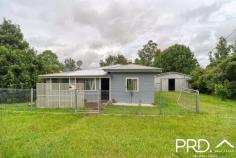  24 Beaury Street Urbenville NSW 2475 $310,000 Situated in the heart of the village of Urbenville, just a short stroll to the local school, shop, hospital and pub, this comfortable home is full of potential. It features three bedrooms plus study, timber floors, tidy kitchen with gas cooking, a covered back patio for entertaining, and a convenient second shower and toilet outside. A great asset to this property is the large (approx 55sqm) shed with bar and storage mezzanine, plus 3 phase power making it ideal as a workshop as well as storage. The property also has 16 solar panels and a flat fenced yard with views towards Crown Mountain. The house has been recently restumped with steel adjustable stumps, as well as fresh paint on the exterior and roof. Ideal for first home buyers, investors, or those simply looking to enjoy the village lifestyle, this home has lots to offer at an attractive price point. 
