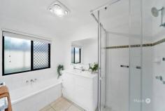  96 Watarrka Dr Parkinson QLD 4115 Welcome to a home that feels just right from the moment you arrive. This beautifully presented residence offers a perfect blend of comfort, space, and simplicity—ideal for families or anyone looking to settle into a peaceful lifestyle. The front garden is neatly landscaped, offering a welcoming path to the front door and a sense of calm with every step. Inside, natural light pours through large windows, highlighting the fresh, neutral palette and polished timber-style floors. The open-plan layout connects the spacious living area to the heart of the home—a sleek and functional kitchen fitted with modern appliances, stone-look benchtops, and ample cabinetry. Pendant lights above the breakfast bar add a warm, stylish touch, making it the perfect spot to gather. Adjacent to the kitchen, the dining nook sits surrounded by large windows and sheer curtains, offering a bright and airy space to enjoy your meals. The main living area flows seamlessly into a second lounge space, cozy and inviting, ideal for relaxing or catching up on your favourite show. The bedrooms are generously sized, with soft lighting, ceiling fans, and built-in wardrobes that offer both comfort and practicality. The master bedroom features a walk-in robe and a private ensuite, while the main bathroom includes a full bathtub, a glass shower, and clean, modern finishes. A separate laundry room adds extra convenience, with direct access to the backyard and plenty of space for everyday needs. Step outside and you'll find a massive, fully fenced backyard with lush green lawns—perfect for entertaining, playing, or simply unwinding at sunset under the soft glow of the sky. Every inch of this home has been thoughtfully styled and well-maintained, giving it a fresh and welcoming atmosphere. From the neat exterior to the light-filled interiors, this is a home where comfort meets simplicity, ready for you to move in and enjoy. Whether it’s relaxing indoors or soaking up the outdoors, this property offers the perfect setting to create your next chapter. What we love about the property: - Split system air conditioning and Ceiling fans - Spacious fully fenced backyard, ideal for kids and pets - Convenient side access to the backyard for trailers or extra storage - Secure double garage with internal access - Breakfast bar with pendant lighting and seating - Stainless steel appliances including oven and dishwasher - Generously sized bedrooms with built-in wardrobes - Master bedroom with walk-in robe and private ensuite - Main bathroom with full bathtub and separate shower - Covered patio area for outdoor dining or relaxing - Beautifully landscaped front garden with neat street appeal - Crisp white interiors with large windows for natural light - Secure mesh screen doors for added ventilation and peace of mind - Located within Stretton State College school catchment 