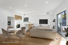  7/18 Phillips Avenue West Wollongong NSW 2500 Embrace a carefree, suburban lifestyle with these meticulously crafted town homes located in the heart of Wollongong. A great place to put down roots, each offering three well-proportioned bedrooms including a spacious main with an ensuite and walk-in wardrobe, a tastefully-designed kitchen with stone benchtops + a walk-in pantry, a double lock-up garage and a peaceful courtyard, where you can enjoy a morning cuppa or simply take a well-deserved time out from the hustle and bustle of the day. Providing a neutral canvas for you to make the space your own, this light-filled residence offers families of all ages and stages the opportunity to be the first to call this delightful town house a home. Features • High ceilings throughout main living areas • Ducted reverse-cycle A/C upstairs and down • Three toilets, 1 downstairs and 2 upstairs • Large bedrooms with built in robes - ensuite off main • Second sitting room upstairs, under stair storage • Situated in a lush cul-de-sac, moments to the CBD 