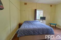  24 Beaury Street Urbenville NSW 2475 $310,000 Situated in the heart of the village of Urbenville, just a short stroll to the local school, shop, hospital and pub, this comfortable home is full of potential. It features three bedrooms plus study, timber floors, tidy kitchen with gas cooking, a covered back patio for entertaining, and a convenient second shower and toilet outside. A great asset to this property is the large (approx 55sqm) shed with bar and storage mezzanine, plus 3 phase power making it ideal as a workshop as well as storage. The property also has 16 solar panels and a flat fenced yard with views towards Crown Mountain. The house has been recently restumped with steel adjustable stumps, as well as fresh paint on the exterior and roof. Ideal for first home buyers, investors, or those simply looking to enjoy the village lifestyle, this home has lots to offer at an attractive price point. 