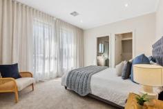  2C Thirza Ave Mitchell Park SA 5043 In a most convenient Mitchell Park position with its wide north-facing street frontage, this brand-new beauty is built for maximum lifestyle with minimal maintenance and a layout you'll love. An inviting formal entry gives way to a highly-sought ground floor master suite, complete with walk-in robe and luxurious ensuite bathroom with neutral full-height tiling and shower niche. Adjacent, a comfortable separate formal lounge, also enjoys that northerly aspect natural light and street outlook. Large format tiles line an elegant kitchen and dining space, where sleek cabinetry, a gas cooktop, dishwasher, most convenient butler's pantry, double sink and pendant lighting over a lengthy breakfast bar make for happy home cooking. Upstairs, a further three bedrooms include a superb alternate master option with mirrored built-ins and an ensuite bathroom, while bedrooms two and three – each with robes – are serviced by a main family bathroom with bath, shower and separate w/c. An upstairs home theatre room will make for memorable movie nights, while adding a welcome second living space or the flexibility of an additional bedroom if required. Under the protection of the main roof, an alfresco entertaining space overlooks a secure courtyard with lawn strip, while a fully fenced front yard provides extra legroom for little legs or furry friends. More you'll adore: - Generous upstairs study nook perfect for a home office setup without compromising a bedroom - Ducted reverse cycle air conditioning throughout - Under stair store room - Double garage with drive-through & internal access + extra driveway parking - Ground floor separate laundry + fourth w/c Convenient to local schools, reserves and bus and train transport and the revamped Marion Hotel & Cellars, you'll find the Park Holme Shopping Centre and local schooling options within easy walking distance, as well as easy access to Westfield Marion, city and sea. Family sized with true flexibility; this one is certain to be an instant favourite. 
