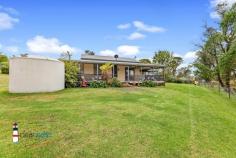  111 Terlichs Rd Verona NSW 2550 $1,300,000 Spring Gully” – 28 usable, fully fenced acres with an historic home set back from the road this historic home is well positioned with ample rural land either side and the rear providing you with a feeling for exceptional country living at its best. There is a large shed near the house, and another near the workshop/storage area. There is a chook yard, vegetable gardens, fully fenced paddocks and plenty of space to run horses, plant an orchard or just have space to let the kids run freely. The large historic home was originally called Casuarina when it was in Bega. It was moved to its current location approximately 28 years ago. Lots of coloured glass, hardwood floors, high ceilings and space for alfresco entertaining are just some of the features of this home. The veranda is on three sides of the home and has some amazing wrought iron panels. A great spot to sit back and enjoy your favourite beverage with views over your property. Verona is a quiet rural area which is popular for people who like the country lifestyle but want to be close to Bega, Cobargo and Bermagui with its pristine beaches. Verona - country living with town convenience. With several schools, shops, Bega hospital, Merimbula Airport only a short drive away, this location makes the perfect place for those desiring a country lifestyle yet close to everything they need. These small acreage lifestyle properties are hard to find in the current market. Features: · 28 usable acres (11.4 ha), all fenced into generous sized paddocks · 110 year old historic home – moved onto site from Bega · Two large sheds – Plenty of storage space for all the farm equipment · Spring fed dams x two. Water is no problem on this farm · Currently running sheep and cattle · Cattle yards and crush · Several water tanks + water from the dam – gravity fed to house/gardens · Slow combustion wood heater · Covered outdoor bbq area · Views over farmland to Mumbula Mountain Call exclusive selling agent Dee Cramb to arrange a viewing on 0421 748 610.. 