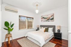  Unit 1/39 McMaster St Victoria Park WA 6100 Be prepared to be impressed from the moment you arrive. Tucked away from the street for enhanced privacy, this exceptional double-brick residence-built to an impeccable standard in 2000-offers a rare combination of solid construction, generous proportions, and premium features throughout. Step through the secure front gate onto a welcoming covered porch, with convenient internal access to the large double garage. Inside, a wide hallway leads to an expansive open-plan living, dining, and kitchen area that immediately impresses with its high ceilings, decorative cornices, and quality finishes. The kitchen is a chef’s delight, featuring a gas cooktop, dual sink, and ample bench space. A large ground-floor bedroom with built-in robes and its own private en-suite provides an ideal guest suite or multigenerational living option. The spacious laundry is also located on the ground level, offering excellent functionality. From the family room, step out to a beautifully presented, undercover alfresco area-perfect for year-round entertaining-surrounded by established, low-maintenance gardens and high fencing for maximum privacy and peace of mind. Upstairs, two generously sized bedrooms each offer abundant built-in storage, with the larger of the two enjoying direct access to the main bathroom. A standout feature of the upper floor is the additional large family/living room, complete with a study nook and access to a private, covered veranda-ideal for relaxing or working from home. Key Features: Three oversized bedrooms with built-in robes Two living areas (one on each level) Two bathrooms Large laundry Kitchen with gas cooktop & quality appliances High ceilings, decorative cornices & wide central staircase Double remote garage with internal access Ceiling fans, three split-system air conditioners Security doors, window locks, alarm system Lockable front gate for added privacy Outdoor alfresco area with low-maintenance gardens. 