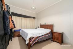  145 Markham Street Armidale NSW 2350 $400,000 - $440,000 Nestled in the heart of Armidale, 145 Markham Street offers the perfect blend of character, space, and convenience. This charming weatherboard home features three generously sized bedrooms and is ideally positioned within easy walking distance to the CBD, schools, shops, and parks. The home’s layout includes a well-appointed main bathroom complete with shower-over-bath, vanity, and toilet, plus a second toilet located in the laundry for added convenience. Two enclosed sunrooms provide flexible spaces ideal for children’s playrooms, home offices, or extra storage. A living room with a wood fireplace creates a warm and inviting atmosphere, while the kitchen offers ample bench space and an adjoining room that could easily be transformed into a butler’s pantry or breakfast nook. Step outside to discover a spacious, fully fenced yard dotted with established trees—perfect for kids, pets, or simply relaxing in the fresh air. A single garage completes the package. Whether you’re a first home buyer, growing family, or savvy investor, this centrally located gem presents endless potential in a sought-after position. 