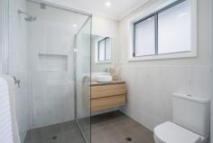  20 Harmony Close Bellbird NSW 2325 $800,000 - $830,000  A spacious 2022 Valley Homes build with stunning features, in a prime location in the popular Mount View Grange Estate – A well planned & landscaped front yard welcomes you to the home and the stunning timber beams that frame the portico are a real feature that sets this home apart from the rest – Dedicated media room to the front with stylish plantation shutters plus an open plan living and dining area with alfresco access – Modern kitchen with soft close cabinetry, 20mm stone benchtops, an extra wide island and breakfast bar, a dual undermount sink, quality 900mm appliances and a walk-in pantry – Four generous bedrooms, all with carpet, ceiling fans and built-in or walk-in robes – Luxurious family bathroom and ensuite, both featuring floating vanities with 20mm stone benchtops, showers with built-in recesses, and a freestanding tub in the main bathroom – The laundry has a full wall linen closet and cabinetry with 20mm stone benchtops – Daikin Air ducted air conditioning throughout the home with separate zones, plus ceiling fans throughout – Soaring ceilings, LED downlights, roller blinds and a neutral palette throughout – Covered alfresco with non-slip tiles, LED downlights, a ceiling fan and outdoor power access overlooking the fully fenced and low maintenance yard space – Double attached garage with extra storage or workshop nook at the back completes the package – Take all the hassle away from building and move into this fantastic family home with nothing to do, inspections are a must! 