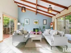  94 Ryans Rd Umina Beach NSW 2257 $970,000 - $1,050,000 Nestled on a quiet street with an amazing bush backdrop, this high-set 3 bedroom family home offers beautiful district views, and complete privacy. While feeling secluded, the property is situated within easy access to primary and secondary schools, Everglades Country Club, shopping centres and the golden sands of Umina and Ettalong beaches, with Woy Woy railway station just a 4.1km drive, commuting to work is a breeze. The home boasts a light-filled and spacious open-plan living-dining area with cathedral ceilings, skylights, and generous windows. The updated country-style kitchen surprises with real timber benchtops and modern appliances. 3 bedrooms look out onto forest and mountain views, all with built-in robes, and the large main with a walk-through robe and ensuite. The surprises continue outside with front and back decks providing ample space to entertain your guests in a spectacular bush setting. There are low-maintenance landscaped gardens (with a mature lime-tree), and plenty of off-street parking for up to 3 vehicles. Other features of this property include - - Air-conditioning - Elevated 834.7 Sqm block - Timber entertaining deck - Main bathroom with bath & oversize shower - Separate laundry room 