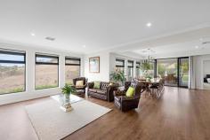  8 Chandler Grove Greenwith SA 5125 $1,600,000 - $1,700,000 A shining example of upsized living, this magnificent four-bedroom residence sits on a 2015 sqm landholding with landscaped zones, natural walking trails and mature trees creating a botanic garden vibe. The palatial 406sqm floorplan basks in tranquil views across rolling hills and gullies, and features four separate living zones, four generous bedrooms and two decadent bathrooms. A perfect fusion of modern luxury elements and grand space creates a dream living experience for families while suggesting fun and freedom can come with a side of finesse. From the airy comfort of the open-style leisurely lounge to the fabulous games room and oversized open plan living with a spectacular kitchen to host grand-scale parties, this home caters to your every whim. The carpeted master bedroom makes itself at home on the ground level, basking in beautiful views across the alfresco and terrace to the natural landscape beyond. It boasts a ravishing ensuite of grand proportions and luxurious appointments... think bidet, bathtub and more. The upper level features the fourth living area - a central-point rumpus room where three more bedrooms and another decadent bathroom converge. Alongside the alfresco is a landscaped terrace where you bask in the autumn sun and enjoy those glorious gully views, as well as a lawn area and firepit zone for wintry outdoor evenings with marshmallows and mates. Highlights: - C.2020 substantial family home with gully views on repeat - 406sqm floorplan on a 2015sqm block - Spacious open-concept lounge, open plan family living area, games room, rumpus - Premium skylit kitchen: waterfall-finished stone island bench, pantry, dishwasher - Carpeted ground floor primary suite with a walk-in robe, ensuite, ceiling fan - Fully tiled ensuite featuring a bathtub, double wall-hung vanity, bidet, double frameless shower - Three generous bedrooms with ceiling fans upstairs - Large, fully tiled family bathroom: bath and shower - Ground floor powder room - Modern laundry - Downlights and feature lighting - 2x Ducted reverse cycle air conditioning - Double glazed windows - Solar Panels - Tiled double garage with internal entry and storage area - Side-gate parking area for trailer, boat or van - Short drive to Highland Village Shopping Centre and bus stops A rare find, this home will blow you away. For more information contact Jakub Ratajczak on 0448 114 454. 