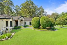  62 The Valley Way Mardi NSW 2259 Set on 2.5 acres (approx.) of lush, manicured grounds, this exceptional single-level residence delivers a rare fusion of elegance, seclusion, and modern comfort. Nestled in a private and picturesque setting, it offers a sanctuary of space, with stunning natural surrounds and a thoughtfully designed home tailored for effortless living and entertaining. Beyond the grand circular concrete driveway, a stately entryway welcomes you to a home of generous proportions, where multiple living areas flow seamlessly to resort-style outdoor spaces. The expansive kitchen, finished with black granite benchtops, forms the heart of the home, while the windows capture breathtaking garden views. Offering four spacious bedrooms, a dedicated study with external access, and a pool house with a bathroom and kitchenette, this residence caters perfectly to families, entertainers, and lifestyle seekers alike. Outdoors, the resort-style pool and spa are complemented by a covered alfresco area with an outdoor kitchen and pizza oven, creating an ideal setting for entertaining. The property also includes a pond, and ample storage options, making it a practical yet private haven, just minutes from Tuggerah Westfield, Tuggerah Railway Station, and the M1 motorway. Features include: – A grand and inviting single-level design with 9ft ceilings, curated for effortless living and entertaining. – Multiple light-filled living areas, including a formal lounge, rumpus room & family room. – Expansive kitchen featuring black granite benchtops, Bosch appliances, a four-burner induction cooktop, a pantry, and a breakfast bar. – Oversized master suite, complete with a walk-in robe and ensuite. – Three additional bedrooms, all with built-in robes + a dedicated study with external access, ideal for a work-from-home situation. – Three beautifully appointed bathrooms + conveniently separate WC, ideal for guests and everyday practicality. – Large laundry with external access, offering ample storage and functionality. – Pool house with bathroom and kitchenette. – Pool and heated spa, powered by 3-phase electricity for year-round comfort. – Covered alfresco area with outdoor kitchen, featuring a gas pizza oven, perfect for entertaining. – Manicured gardens, and a picturesque pond, creating a peaceful retreat. – Charcoal coloured concrete circular driveway with grand fountain feature, enhancing street presence and accessibility. – Three-car garage with internal access + separate gardening garage. – Caravan port and garden shed, providing additional storage and practicality. – Council rates: $3,000 (approx.) pa. Extras: 6.6kW solar system, Envirocycle system, x2 underground 22,500L concrete tanks (totalling 45,000L), provision for a wood log heater in the family room, 3 gas bayonets for heating, and ducted air conditioning throughout the home. This prestigious acreage offers an unparalleled lifestyle of space, privacy, and accessibility. While embracing the tranquillity of its natural surrounds, it remains just moments from Tuggerah Westfield, quality schools, and the M1, providing seamless access to Sydney and Newcastle.  