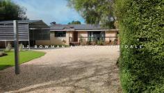  12 Bowman Avenue Armidale NSW 2350 $599,000 - $650,000 Nestled in a quiet and convenient South Hill location, 12 Bowman Avenue offers the perfect blend of comfort and practicality for families looking to upgrade their space. Positioned close to local corner stores, parks, playgrounds, and a netball court, this North-facing home is ideal for those seeking both lifestyle and convenience. Step inside to discover polished floorboards and a warm, inviting atmosphere. The main living room features a cosy wood heater with a detailed hearth, as well as sliding doors that open onto the front veranda, creating a seamless indoor-outdoor flow. The kitchen and dining area is designed for family living, boasting ample cupboard space, a breakfast bar, dishwasher, double sink, and gas stove. The home includes three generously sized bedrooms, all with built-in robes, while the renovated main bathroom offers a large shower with a shower shelf, vanity, and a separate toilet for added convenience. Outside, you’ll find a double carport, solar panels, well-manicured lawns and gardens, a garden shed, and a fully fenced yard, perfect for children and pets. Additionally, the property features a versatile studio space, ideal for guest accommodation, a home office, or a creative retreat. Don’t miss this fantastic opportunity to secure a spacious family home in a highly desirable location! 
