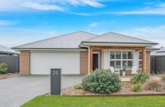  20 Harmony Close Bellbird NSW 2325 $800,000 - $830,000  A spacious 2022 Valley Homes build with stunning features, in a prime location in the popular Mount View Grange Estate – A well planned & landscaped front yard welcomes you to the home and the stunning timber beams that frame the portico are a real feature that sets this home apart from the rest – Dedicated media room to the front with stylish plantation shutters plus an open plan living and dining area with alfresco access – Modern kitchen with soft close cabinetry, 20mm stone benchtops, an extra wide island and breakfast bar, a dual undermount sink, quality 900mm appliances and a walk-in pantry – Four generous bedrooms, all with carpet, ceiling fans and built-in or walk-in robes – Luxurious family bathroom and ensuite, both featuring floating vanities with 20mm stone benchtops, showers with built-in recesses, and a freestanding tub in the main bathroom – The laundry has a full wall linen closet and cabinetry with 20mm stone benchtops – Daikin Air ducted air conditioning throughout the home with separate zones, plus ceiling fans throughout – Soaring ceilings, LED downlights, roller blinds and a neutral palette throughout – Covered alfresco with non-slip tiles, LED downlights, a ceiling fan and outdoor power access overlooking the fully fenced and low maintenance yard space – Double attached garage with extra storage or workshop nook at the back completes the package – Take all the hassle away from building and move into this fantastic family home with nothing to do, inspections are a must! 
