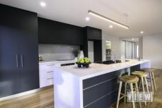  20 Madeline St Latrobe TAS 7307 $825,000 Are you looking for less maintenance but not ready to sacrifice space or style? This elegant, quality-built, brand new home is set on a low-maintenance 471m² block with its own title and offers a stylish living solution without the upkeep of a larger property. Elegant Design & Entry – On entering the property you are welcomed by an exposed aggregate driveway with a lock up garage and additional off-street parking to accommodate a second vehicle, caravan, or trailer. The homes front entrance has a sense of grandness, with its unique multi-direction stairway leading one direction to the sheltered timber-lined entry landing and another directly into the landscaped, fully fenced garden. Inside, a spacious entry boasts ample built-in storage on both sides creating a welcoming space without compromising roominess. Light-Filled Living with Scenic Views  – Enjoy sunlit open-plan living spaces with views of Bells Parade parklands and glimpses of the Mersey River through the trees. Imagine enjoying the changing of the seasons with Autumn colours right from your windows! Primary Bedroom Suite  – The expansive main bedroom, is a generous 4 x 5m and overlooks serene parkland views. It can comfortably accomodate a king size bed with enough room left for additional furniture. There’s even a convenient TV outlet installed for leisurely in-room TV viewing. Being located away from the rest of the sleeping quarters and with its own spacious walk-in robe and a stylish ensuite, this room offers ultimate privacy & peace. Additional Bedrooms/Bathroom Area – In a separate section of the home you’ll find two additional, well-sized bedrooms, a separate toilet, and a large bathroom featuring a floating vanity, walk-in shower, and a freestanding soaker tub, which is perfect for unwinding at the end of a long day. Functional & Stylish Laundry & Garage Space  – The thoughtfully designed laundry room includes ample storage, a clever in-cupboard laundry hamper, and direct outdoor access. The extra height, single garage features a 10FT ceiling, ideal for large vehicles. Sleek Kitchen & Pantry – The kitchen impresses with elegant matte dark green custom cabinetry and waterfall-edge countertops. A plumbed-in fridge alcove, built-in air-fryer/oven, electric cooktop and a dishwasher offer a kitchen space that is functional yet easy to keep clean. A walk-in pantry located near by is equipped with ample shelving, power points, and countertop space, keeping the main kitchen clutter-free. Easy Access for Indoor-Outdoor Living  – From the dining area, step directly out to an extra large entertaining area and fully fenced garden that wraps around the home. Low-maintenance garden beds and artificial turf make upkeep a breeze, leaving you more time to enjoy the scenic views and relax with a morning coffee or a glass of wine while watching the world go by. Extra Features Beautiful Tasmanian Oak floors flow through the hall, kitchen, and living areas, while the wet areas feature practical tiles and the bedrooms offer the cosiness of carpet. A Daikon Reverse Cycle Split System keeps the home cool in Summer and warm & cosy in Winter, while block-out roller blinds throughout also assist with climate control and offer privacy. Prime Location & Community Amenities – Situated close to local restaurants, scenic walking trails, and essential amenities like the local pharmacy and shops, this home truly lets you enjoy Latrobe living at its best. Move in, Relax, & Savour Life in Bells Parade in a Home Where Style Meets Convenience! Call Colin on 0408 666 301 to book your VIEWing. 