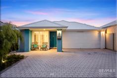  18 Wandering Way Alkimos WA 6038 $699,000 Beautifully presented from start to finish, this classy coastal home is conveniently located in the heart of the suburb within a few minutes’ walk to all the amenities and the tranquil blue waters of the Indian Ocean! With a host of quality upgrades and an elegant finish throughout, it offers you the perfect opportunity to enjoy the beachside lifestyle without the upkeep! Whether you’re a first home buyer, downsizer, retiree or savvy investor, don’t miss out – secure your slice of beachside paradise today! Tucked away in the highly desirable Alkimos Beach community, this thoughtfully designed 3×2 home offers the perfect blend of modern comfort, coastal charm, and convenience. Just a short stroll from family-friendly parks, the bustling Gateway shopping precinct, medical centres, gyms, and popular local bars and restaurants, this home places everything you need right on your doorstep. With the sparkling Indian Ocean just moments away, and the Alkimos Surf Lifesaving Club watching over the coastline, you can enjoy endless outdoor activities – from swimming and surfing to fishing and breathtaking sunsets. Commuting is now a breeze with the Alkimos train station and easy access to the Romeo Road freeway just five minutes away. From the moment you arrive, the coastal inspired façade catches the eye, with a vibrant turquoise portico which compliments the soft neutral render. With a double garage and extended driveway, there is plenty of room for the guests to park and additional space for a boat, trailer or a caravan. The master bedroom is positioned in the centre of the home and features a spacious walk-in robe, vinyl plank flooring, and stylish plantation shutters that add an extra touch of sophistication. The adjoining ensuite features a hobless shower, upgraded vanity with modern fixtures & fittings. The two minor bedrooms are both doubles, with sliding mirrored wardrobes, vinyl plank flooring, quality window treatments and bedroom 3 has built in cabinetry for extra storage convenience. Both rooms share a neat & tidy family bathroom which is finished to a high standard. A true selling point to this stunning residence has to be the deluxe kitchen, which has been designed to blend style with functionality. The sleek ‘Essa’ stone countertops are paired with top of the range 900mm stainless steel appliances, rangehood, stone splashback, dishwasher (neg) and a commercial grade double sink, while ample space for a double fridge ensures practicality. Generous overhead cupboards & drawer space, an extended breakfast bar and feature pendant lighting create the perfect setting for both cooking and entertaining. When it comes to chilling out with your loved ones, the open plan living & dining area embodies a relaxed, beachy vibe and an inviting, airy atmosphere for the whole family to enjoy! Step outside to the alfresco & easy-care courtyard – a peaceful retreat away from the hustle and bustle of everyday life. This outdoor space is perfect for summer BBQ’s & cold drinks or simply a quiet place to read your favourite book. Whether you’re looking for a low maintenance lock-and-leave residence or a relaxed beachside lifestyle, this property will tick all the boxes. EXTRAS INCLUDE: Double remote garage + attic storage, separate laundry + fitted linen, solar panels, ducted reverse cycle air-con, 2x security cameras + monitor, additional TV & data points, LED lighting, 4x TV Brackets, solar hot water system, skirting boards, TV Cabinet, and so much more! 