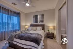  10 Corbin Walk Officer South VIC 3809 $600,000 - $660,000 Ideal for first home buyers or downsizers, this modern and bright double-storey three-bedroom townhouse is located within the sought-after Kaduna Park Estate. Overlooking a serene park, it offers a convenient and relaxed lifestyle. The home features high ceilings and an open-plan design, with two living areas (one upstairs and one downstairs) plus outdoor spaces for everyone to enjoy. The stylish kitchen includes a stone-topped island bench, gas cooktop, oven, and dishwasher, perfect for home chefs. Step outside to a low-maintenance, undercover decked area, ideal for entertaining guests. The downstairs master bedroom boasts a private ensuite and walk-in wardrobe, while upstairs, two additional bedrooms with built-in robes and new carpeting offer comfort and privacy. An upstairs retreat area can serve as a teen hangout, games room, or quiet study/home office, and the private balcony provides lovely views. The main family bathroom is upstairs with a separate WC, plus a bonus powder room off the entry for guests. Additional comforts include fans, ducted heating, split system air conditioners, tinted front windows, and a double garage with storage shelving and internal access. Conveniently located, you're just minutes from Cardinia Road train station, Arena Shopping Centre, Lakeside Shopping Centre, Caversham Waters Wetlands, and a variety of schools, childcare centres, and recreational facilities. Don't miss out on this fantastic opportunity! Book an inspection today and make this house your home. 
