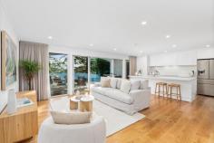  18 Day St Wyoming NSW 2250 A stunning fusion of timeless design, quality craftsmanship, and modern elegance, this spacious family sanctuary occupies a prime position in one of Wyoming’s most desirable pockets. Thoughtfully enhanced by its current owners, the home showcases an intuitive split-level layout that’s perfect for large families, entertainers, and those who appreciate the finer details. At the heart of the home, the open-plan kitchen, living, and dining area flows seamlessly to an al fresco entertaining zone with captivating views across the resort-style swimming pool and level backyard, framed by leafy vistas and vibrant sunsets. Features include: – Impressive street presence with beautifully landscaped gardens and a striking entry foyer, enhanced by timber tones and soaring ceilings. – Spacious main living zone with warm hardwood floors, a neutral colour palette, and effortless indoor/outdoor flow to the covered entertaining deck. – Designer kitchen with in-built Bosch dishwasher, Westinghouse extra-wide oven and cooktop, island bench with breakfast bar, sleek stone countertops, timber accents, and a cleverly designed scullery for added prep and storage space. – Five generously sized bedrooms, each with built-in robes and ceiling fans; master suite complete with stylish ensuite bathroom. – Main bathroom with walk-in shower, floating vanity, floor-to-ceiling tiles, and indulgent freestanding tub. – Additional powder room (third WC) conveniently located near the entry. – Elevated outdoor entertaining area overlooking the sparkling pool and large, level backyard – perfect for kids, pets, and relaxed weekend gatherings. ***DA approval in place for double carport and double garage*** TBC – Versatile off-street parking for multiple vehicles. This beautifully presented home offers a harmonious blend of comfort, sophistication, and functionality – ready for you to simply move in and enjoy. All set within moments of local schools, shops, cafes, and public transport, with easy access to the M1 motorway, University of Newcastle (Ourimbah campus), and the lifestyle attractions of Erina Fair, Westfield Tuggerah, and Central Coast beaches.  