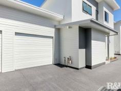  Unit 2/21 Warrah St Hamilton East NSW 2303 $1,200,000 - $1,300,000 Welcome to 2/21 Warrah Street, Ettalong Beach. This is the last of the three stunning townhouses available. This brand-new townhouse is positioned in a sought-after location that is approximately a 500 metre level walk to Ocean Beach and 600 metres to the local Shopping Precinct. The townhouse features include: - Three large bedrooms all with robes and ceiling fans the master conveniently located downstairs with a walk-in robe and designer ensuite bathroom with floor to ceiling tiling, semi frameless shower, toilet, and custom vanity - The main bathroom features floor to ceiling tiling, shower, free standing bathtub, toilet and custom vanity. A powder room downstairs with a toilet and washbasin. - Generous open plan lounge and dining flows to the covered alfresco space. A second living area is positioned upstairs with a double linen press. - The kitchen is large featuring Fisher Paykel dishwasher, 600mm induction cooktop, under bench oven, slide out drawers soft close to pantry ideal for maximising space and 20mm tops - A generous covered alfresco space flowing off the dining area is perfect for entertaining family and friends with an east facing courtyard which is maintenance free - The ceilings are 2.7 metres that accentuate size and space with 7.2kw Fujitsu ducted air conditioning throughout the home and alarm system for security - The home offers an oversized single garage with internal access and automatic door with a fitted laundry unit - Engineered Oak timber flooring in the downstairs dining and living are and from the stairwell and upstairs bedrooms all carpeted - Natural gas and NBN connected 