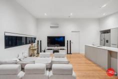  38 Summit Drive Coffs Harbour NSW 2450 $759,000 - $779,000 Set high among the treetops, this modern and well-appointed townhouse offers a peaceful retreat with the added benefit of cooling ocean breezes and lovely views of the surrounding bushland and coastline. With a practical, low-maintenance design and an inviting atmosphere, this home is ideal for buyers seeking a relaxed coastal lifestyle with everyday convenience. Inside, the open-plan living and dining area creates a spacious, light-filled environment that's perfect for both casual living and entertaining. Bamboo flooring adds a touch of warmth and character, while large sliding doors open onto a generous, covered timber deck. This outdoor space is perfect for enjoying morning coffee, hosting friends, or simply relaxing in the fresh air. The kitchen is thoughtfully positioned to connect with the main living area and features quality finishes including Caesarstone benchtops, stainless steel appliances, and a breakfast bar. It's a functional and stylish space that makes everyday cooking and entertaining easy. The air-conditioned master bedroom provides a quiet space to retreat, complete with a walk-in wardrobe and a modern ensuite with a double vanity. Two additional bathrooms-one upstairs and one on the lower level-add flexibility and comfort for families, guests, or shared living arrangements. Additional features include air-conditioning in the main living area for year-round comfort, double-glazed windows that enhance energy efficiency, and a secure double lock-up garage with remote access and internal entry. Conveniently located within walking distance of Park Beach Plaza and Homebase shopping centres, and just a short drive to several beautiful beaches, this home combines lifestyle and location. Whether you're downsizing, investing, or looking for your next home, this is a fantastic opportunity to enjoy easy living in one of the region's most sought-after areas. 