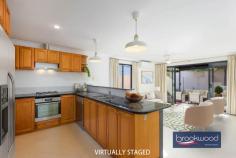  Unit 4/186 Collier Rd Bayswater WA 6053 $725,000 Set in a spacious strata complex surrounded by established gardens maintained by the body corporate, this three-bedroom unit offers the perfect balance of comfort and convenience. This home embodies modern living with luminous interiors, multiple living zones and a private alfresco entertaining area. 3 bedrooms 2 bathrooms 2004-built brick and tile Formal and informal living Central open-plan design Good indoor-outdoor flow Gabled alfresco entertaining 2-car garage with shoppers’ Visitor parking, retic garden 264 sqm block approx Ideally located strata unit As you arrive at this property, you’ll immediately appreciate the thoughtfully designed complex – an arrangement of single-storey and townhouse-style units configured to ensure space and privacy. The established gardens, meticulously maintained through bore-fed reticulation, create a welcoming atmosphere before you even step inside. The front door opens to reveal a formal lounge/media room where sunlight passes through the leadlight door and dances across large white floor tiles, creating a kaleidoscope of colours. This versatile space flows seamlessly into the principal suite – an air-conditioned, carpeted retreat complete with a walk-in robe and private ensuite. Continue through the lounge to discover the heart of the home: a central open-plan living area comprising a meals area, family room and kitchen. The kitchen features warm timber cabinets and premium stone benchtops surrounding quality appliances including an electric oven, four-burner hob and dishwasher. Stylish pendant lights suspended above the kitchen bench add a touch of contemporary elegance. A pair of sliding glass doors creates a seamless transition from the family room to a paved entertaining area sheltered by a gabled roof. Here, a high rendered wall and fencing, complemented by garden beds and a small lawn, ensure privacy, creating an idyllic setting for alfresco dining and entertaining friends and family year-round. A short hallway leads from the open-plan living zone to two additional carpeted bedrooms, each fitted with built-in robes and ceiling fans. This wing of the home also features a family bathroom, a separate WC and a practical walk-through laundry. Practicality hasn’t been overlooked, with a two-car garage positioned at the front of the unit offering a convenient shopper entry and backyard access. The location truly elevates this property to exceptional status. Positioned within easy reach of schools and offering excellent access to public transport and arterial road links, you’ll enjoy the perfect blend of peaceful living and urban convenience. Life’s necessities – and joys – are all within comfortable proximity. This unique and appealing unit offers the reassurance of a relaxed, friendly strata community while maintaining the privacy and comfort traditionally associated with standalone homes. Whether you’re looking to downsize without compromising your lifestyle or ready to purchase your first property, this home presents as a fantastic opportunity to embrace a balanced, convenient and comfortable lifestyle. 