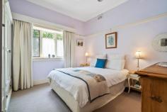  87 Cascade Street Katoomba NSW 2780 $1,100,000 - $1,200,000 Seldom does a property as unique as this come to market. Secreted behind an established leafy entry, this substantial and charming 1920s double-brick home offers timeless character integrated with modern comforts. Featuring high ceilings, polished wood floors and an enticing sunroom entrance, this home presents two queen-sized bedrooms and a versatile study or third bedroom on the first level. The spacious eat-in kitchen, with a slow combustion fire, opens onto a protected entertaining deck, providing an elevated outlook over the well-tended garden haven below. For those looking for additional rental income and guest accommodation, the lower level includes both a self-contained one-bedroom flat and an alternative annexe, both with their own private entrances. Enjoying easy access to all the amenities of Katoomba town just a 300 meter walk away, this is definitely one to add to your priority viewing list. Breakdown of Features: • 1920s double-brick home with high ceilings and polished wood floors • Sunroom entrance with leafy outlook and seamflow to separate living • Two queen-sized bedrooms plus a home office or third bedroom • Generous eat-in kitchen with slow combustion wood fire • Ducted gas central heating throughout main upper house (convert to a/c if desired) • Protected entertaining deck with fabulous elevated garden views • Lower level with self-contained one-bedroom flat, currently tenanted • Additional separate living annex with individual entrance from rear; study • 6.6kw solar panels installed; FTTP internet with ethernet cable from modem to lounge TV • Covered patio area with access to carport, 300m walk to Katoomba town 