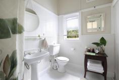  1 Neale Street Katoomba NSW 2780 $940,000 - $970,000 Nestled in the heart of the World Heritage listed Blue Mountains and just 350 metres from the vibrant heart of Katoomba, this enchanting 3-bedroom character cottage offers the ultimate retreat from the everyday. Brimming with timeless charm and natural light, this lovingly restored home blends vintage elegance with modern comforts, the perfect escape for those seeking serenity and style. From its striking timber fretwork to the glow of original Baltic timber floors underfoot, every detail tells a story. High ceilings, antique light fittings, and a cozy slow-combustion fireplace invite you to unwind in warmth and comfort. The country-style kitchen retains its original wood-burning stove, offering a delightful nod to the past alongside modern functionality. Step outside to discover lush, cool-climate gardens enveloping the home in complete privacy, while the north-facing living room opens to an inviting alfresco deck, perfect for quiet mornings or relaxed entertaining. Adding to the allure is a Japanese-inspired studio space, a peaceful haven for creativity and recreation. With dual access from both Neale Street and Hindman Street, and convenient off-street parking, this unique property truly offers flexibility, charm, and location in equal measure. Whether you're seeking a character-filled permanent residence, a stylish weekender, or a high-appeal holiday rental, this picturesque cottage is a must-see. Property Highlights: • Beautiful period features including timber fretwork, high ceilings & Baltic timber floors - Circa 1930's • Flooded with natural light through picturesque character windows • Slow-combustion fireplace and natural gas heating • Charming country kitchen with original wood-burning stove • Three good sized, peaceful and light-filled bedrooms • Living room flows to an alfresco entertaining deck and covered front porch • Freshly painted interiors and antique period light fixtures • Upgraded bathroom with ample storage • Garden studio and garage • Dual street access with individual driveways from Neale & Hindman Streets • R2 - Low Density Residential Zoning - BMCC • Established cool-climate gardens ensuring privacy and tranquillity • Prime location just a short stroll to Katoomba shops, cafés, Echo Point & walking trails • Inspections highly recommended - your mountain sanctuary awaits. 