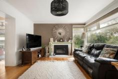 4 Palmerston Crescent Frankston South VIC 3199 $1,200,000 - $1,320,000 Taking full advantage of its prime beachside location atop Olivers Hill, just a leisurely stroll from Frankston Beach, Sweetwater Creek Reserve, and the Norman Avenue shops, this private home unveils a relaxed beachside lifestyle across its low-maintenance Frankston High School Zone address. With its thoughtfully designed four-bedroom layout that maximises natural light, this inviting home presents an exceptional opportunity for growing families eager to infuse their personal style into every corner. Introduced via solid timber floors and a dedicated lounge, where a charming gas log fireplace invites cosy evenings with loved ones, the single-level layout opens to a well-equipped kitchen that boasts premium appliances, including a Fisher & Paykel electric cooktop, Bosch wall oven, and dishwasher, making meal preparation a pleasure. The warmth of the summer air enhances a covered deck alfresco, providing a restful setting to watch the kids at play, or privately entertain with a serene garden backdrop featuring a children's cubby and double garage/storage. With four bedrooms each featuring ceiling fans, set alongside a main bathroom, compact study, dedicated laundry, large side shed, and ample off-street parking, the home's comforts continue with gas ducted heating and evaporative cooling. Ideal for young families and couples eager to embrace opportunities that nurture their creative vision, this 1,011sqm (approx.) block is just moments from Bayside Shopping Centre, Mount Eliza Village and public transport, allowing for a lifestyle that blends beachside leisure with everyday conveniences. 