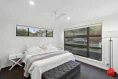  202 Dress Circle Coffs Harbour NSW 2450 $819,000 - $839,000 If you've been searching for a home that offers stunning views and a well-thought-out layout to suit a relaxed yet functional lifestyle, this could be just what you've been waiting for. Designed with space and privacy in mind, this property strikes the perfect balance between low-maintenance living and stylish comfort. Step through the elegant blackbutt timber front door and be welcomed into a spacious entryway that leads directly to the sunlit master suite. Featuring double-hung windows that capture the natural light, a walk-in robe, and a sleek ensuite, this retreat is both practical and peaceful. Convenient internal access from the remote-controlled single garage is also located on this level. Just a few steps down, you'll find the open-plan living, dining, and kitchen zone. While the interiors are beautifully appointed, the real showstopper is the view - take in sweeping sights of Muttonbird Island and the city escarpment from your living room. Whether you're entertaining friends, sipping a sunset cocktail, or curling up with a book, this space will quickly become your favourite spot in the home. Continue down and you'll discover a versatile space that could function as a second living area or third bedroom. Complete with a walk-in robe or storage space and its own private entrance, this room is ideal for a young adult craving a little independence. The main bathroom, finished in calming neutral tones with a full bathtub, is also located on this level. One more flight down and you'll find another generous bedroom featuring built-in robes, ceiling fans, and expansive windows that frame yet more breathtaking views. This room opens onto a deck - perfect for quiet study sessions or simply soaking in the scenery. You'll also find the laundry and drying area thoughtfully tucked away on this level. The outdoor spaces are beautifully landscaped for minimal upkeep, with enough room for pets to roam. Plus, nearby nature reserves and walking tracks make it easy to stay active and connected with the outdoors. Whether you're after a permanent home, a smart investment, or a weekend getaway, this property deserves your attention. 
