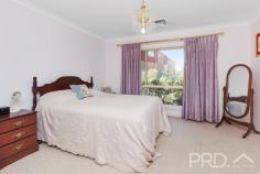  11 The Pavilion Tumut NSW 2720 $799,000 Perched high in an exclusive and quiet cul-de-sac, with elevated views of the picturesque town of Tumut and its surrounds. You will love the versatility and functionality of this well-appointed family home. Offering great diversity of living, both upstairs and down, 11 The Pavilion boasts four great sized bedrooms, multiple living rooms and rumpus area, study and a total of three bathrooms over the two levels. With additional timber decks on both levels and ample secure space for vehicles, boats or caravans. This is a central opportunity that is not to be missed. Call today to book your inspection! Premiere Features: - Four great sized bedrooms all with ducted reverse cycle air conditioning, master boasting walk in robe and ensuite - Main bathroom with separate bath and shower room and powder area positioned adjacent with separate toilet - Ensuite boasts shower, toilet and single vanity - Large centrally located entertainer's kitchen with electric cooktop, stainless appliances including dishwasher, ample cabinetry options and bench space, including display cabinetry and large island bench (boasting water, power and breakfast bar) - Free flowing open plan tiled living and dining area's directly off the kitchen, all designed to take in the picturesque surrounds and capitalise on its elevated positioning - Formal additional lounge room upstairs - Formal study upstairs with direct external deck access - Partially covered timber deck, perfect for outdoor entertaining or simply taking in the picturesque surrounds - Fourth bedroom with built-ins is located downstairs and currently used as a rumpus room - Formal rumpus with direct external access - Third bathroom positioned downstairs with shower, toilet and single vanity - Great sized laundry with external access to rear yard - Downstairs covered external entertaining - Double lockup garage with direct internal access and additional access to secure dry storage and subflooring - Secure lock up shedding with additional 2 side awnings, perfect for additional cars and or boats - Garden shedding - Ducted reverse cycle air conditioning throughout the upper level - Internal stairs - Approximate 1,016m² allotment with low maintenance manicured grounds - Walking distance to major local sporting and recreational facilities Do not miss your opportunity to secure this very versatile family home with an elevated aspect of the picturesque surrounds of Tumut.  