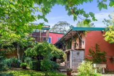  87 Cascade Street Katoomba NSW 2780 $1,100,000 - $1,200,000 Seldom does a property as unique as this come to market. Secreted behind an established leafy entry, this substantial and charming 1920s double-brick home offers timeless character integrated with modern comforts. Featuring high ceilings, polished wood floors and an enticing sunroom entrance, this home presents two queen-sized bedrooms and a versatile study or third bedroom on the first level. The spacious eat-in kitchen, with a slow combustion fire, opens onto a protected entertaining deck, providing an elevated outlook over the well-tended garden haven below. For those looking for additional rental income and guest accommodation, the lower level includes both a self-contained one-bedroom flat and an alternative annexe, both with their own private entrances. Enjoying easy access to all the amenities of Katoomba town just a 300 meter walk away, this is definitely one to add to your priority viewing list. Breakdown of Features: • 1920s double-brick home with high ceilings and polished wood floors • Sunroom entrance with leafy outlook and seamflow to separate living • Two queen-sized bedrooms plus a home office or third bedroom • Generous eat-in kitchen with slow combustion wood fire • Ducted gas central heating throughout main upper house (convert to a/c if desired) • Protected entertaining deck with fabulous elevated garden views • Lower level with self-contained one-bedroom flat, currently tenanted • Additional separate living annex with individual entrance from rear; study • 6.6kw solar panels installed; FTTP internet with ethernet cable from modem to lounge TV • Covered patio area with access to carport, 300m walk to Katoomba town 