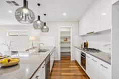  3 Frank St Oaklands Park SA 5046 $849,000 - $899,000 In an Ideal location along quiet Frank Street, this chic 2013-built courtyard epitomises easy care contemporary living. Boasting excellent street appeal, this charming home is just as immaculate inside as it is outside, beginning with a central entry hall offering easy access to two of the three bedrooms, including a well-proportioned master with ceiling fan, walk-in robe and ensuite bathroom with semi-frameless shower and huge vanity. Bedrooms two and three – each with mirrored built-in robes – are well serviced by a central main bathroom with inset bath, shower and convenient separate toilet. A gorgeous open plan kitchen, living and dining space at the rear is ever inviting with warm timber floors and lovely natural light; the crisp white kitchen complete with full-height overhead cupboards, a gas cooktop, dishwasher, breakfast bar and enviable walk-in pantry. Sliding doors onto an alfresco space under the main roof make for easy outdoor entertaining, the paved area bordered by a neat lawn strip with established Magnolia border adding equal parts prettiness and privacy. More you'll adore: - Ducted reverse cycle air conditioning throughout - Separate laundry - Single garage with store space + internal access - Plantation shutters throughout Schools, reserves, hotels, bus and train transport, Westfield Marion Shopping Centre, you name it; with endless conveniences right around the corner and just 4kms from the Brighton Jetty, there's so much to love about this highly-sought neighbourhood. Looks, lifestyle and location, this one has it all. 
