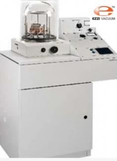 A state-of-the-art laboratory showcasing advanced Thin Film Deposition Systems , with sleek stainless-steel vacuum chambers and precision control panels illuminated by soft ambient lighting. The systems are arranged on cleanroom-grade surfaces, emphasizing their role in achieving seamless surface perfection . In the background, technicians in lab coats and gloves monitor the process through digital interfaces. The environment highlights cutting-edge Vacuum Solutions essential for high-purity thin film applications in semiconductors, optics, and nanotechnology.