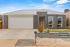  74 Mast Ave Seaford Meadows SA 5169 $699,000- $760,000 With a wonderful north-facing frontage overlooking a quiet reserve, this contemporary courtyard home is just 2kms from the Seaford Esplanade. Three bedrooms include a front-positioned master suite flooded with natural light, where double fronted windows overlook the street, and a walk-in robe and dual vanity ensuite add extra luxury to your every day, while a central main bathroom with inset bath, shower and separate toilet and vanity adds convenience for bedrooms two and three. A tiled kitchen with 900mm gas cooktop and oven, dishwasher, island with breakfast bar and excellent storage overlooks a spacious living and dining space at the rear, sliding doors opening onto a covered outdoor entertaining area. Private and secure, the yard is complete with a sizeable side lawn strip perfect for little legs of furry friends. More to mention: - Ducted reverse cycle air conditioning throughout - Solar panels - Double garage with internal access + single drive-through access - Separate laundry - 2017-built Just a few hundred metres from the train, you'll find Seaford Central shopping, Seaford Secondary College, other shops and local reserves and sporting clubs just around the corner; world-class McLaren Vale wineries at your fingertips and the Adelaide Hills within easy reach, all just over half an hour to the CBD. 