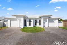  1 / 30 Lady Elliott Crescent Eli Waters QLD 4655 $685,000 Newly constructed duplex in Eli Waters, modern open plan living in a quiet location. Can be sold separately and both unit 1 & unit 2 are available, great opportunity for an extended family or live in 1 and rent the other. • 4 bedrooms, all with built ins and main bedroom with walk in robe • Spacious ensuite to main bedroom • Main bathroom has bath, shower, toilet and vanity • Open plan living dining and kitchen area • Separate media room • Stylish well appointed kitchen with breakfast bar • Ducted air conditioning throughout • Lock up garage with remote door and direct internal access • Fully privacy fenced with secured turfed back yard • Undercover outdoor entertaining area • Town water, sewer, power and NBN Ready • Yarrilee State School & Xavier Catholic College close by • Eli Waters Medical Centre & Eli Waters Shopping Centre • Short drive to CBD & Hospitals 