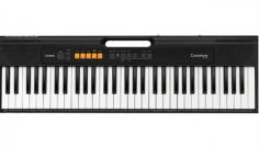  A sleek Roland Digital Piano is elegantly displayed in a modern, well-lit showroom. The piano’s glossy black finish and realistic weighted keys reflect studio-quality craftsmanship. Behind it, a sign reads “ Piano Warehouse in Melbourne ,” surrounded by neatly arranged shelves of music books and accessories. The ambiance blends professionalism with a warm, inviting feel, showcasing the premium build and sound excellence of Roland Digital Pianos . Perfect for musicians seeking high-performance instruments in a trusted Melbourne location.