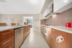  4 Chamberlain St Cranbourne East VIC 3977 $825,000 - $875,000 Room for the Whole Family? You Bet! Flawlessly presented and thoughtfully designed for comfort and convenience, this impressive residence is set on a generous 676m² (approx.) allotment with side access, nestled in a quiet, family-friendly street. Created with the modern family in mind, the flexible open-plan layout offers three separate living zones, providing ample space for everyone to relax, work, or play. Accommodation includes four well-appointed bedrooms, with the master suite featuring a walk-in wardrobe and private ensuite. The additional bedrooms include built-in robes and share a stylish central bathroom. At the heart of the home, the modern kitchen overlooks the spacious family and dining areas, flowing seamlessly to the large covered alfresco, ideal for year-round entertaining. Additional features include ducted heating and evaporative cooling for year-round comfort, a double-car garage, perfectly positioned in a sought-after pocket of Cranbourne East, with schools, shops, parks, and public transport all just moments away — this is the home you’ve been waiting for! 