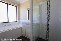  18 Gunton Circle Castletown WA 6450 Located directly across from beautiful parklands and a tranquil lake, this well-appointed 4 bedroom, 2 bathroom home offers the perfect blend of space, comfort, and convenience. Boasting three versatile living zones – including a formal lounge, expansive open-plan family area and a separate games room – there’s room for everyone to relax or entertain. Step outside and enjoy seamless outdoor living with dual access from both family living and games room to the undercover patio, ideal for year-round entertaining. Additional features include: • Double carport • Garden shed • Side access – perfect for extra vehicles or trailer storage • Generous 4 bedrooms with robes and spacious WIR to main • Kitchen with ample storage cupboards, dishwasher recess and underbench oven • Government body lease in place until November 2025, returning approx. $2,815 per month with negotiation for earlier possession possible. • Easy care 642sqm block Whether you’re looking for a rock-solid investment or a future family home in a sought-after location, this property ticks all the boxes. 