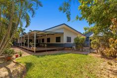  6 Yarri Way Cable Beach WA 6726 $770,000 Set on a generous 741sqm block in a quiet street just a short walk to the famous Cable Beach, this 4-bedroom, 2-bathroom home offers the perfect balance of space, comfort, and investment potential. Built on stumps for better air flow, the home boasts a well-maintained interior with open-plan living, a functional kitchen, and established gardens with mature plants. These really enhance its relaxed, tropical feel. Currently tenanted with a fixed lease through to October 2026, Offering effortless investment appeal in one of Broome's most desirable areas. • Massive living area • Expansive timber decked outdoor entertaining • Four spacious bedrooms • Security screens throughout for added comfort and peace of mind • Great location close to beach • Leased until mid Oct 2026 at $1125p/w 