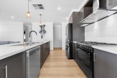  484 Riverside Avenue Mildura VIC 3500 $574,000 - $631,000 Katrina Wootton, Sales Agent & Marketing Specialist at Ray White Mildura, is showcasing this modern home family abode, boasting a substantial land holding of 801 square metres, exuding contemporary charm and an alluring promise of low maintenance living, perfect for the modern family. Constructed in the year 2015, this delightful brick veneer property presents a picture-perfect setting with its large and neatly manicured block. Its open-plan design is both inviting and functional, featuring an expansive living and dining area that seamlessly integrates with the outdoors through elegant bifold doors, perfect for alfresco entertainment. The heart of the home is undeniably its fully equipped kitchen, which is adorned with a central island bench, high-quality laminex benchtops, and natural gas cooking facilities, including a large oven and cooktop, complemented by a walk-in pantry for ample storage. The master suite offers a serene retreat with its own split system unit, a generous walk-in robe, and a private ensuite. The additional two bedrooms are well-appointed with built-in robes and ceiling fans, while the main bathroom provides a built-in bath for those relaxing soak sessions. Comfort is paramount, with ducted gas heating and evaporative cooling ensuring an ideal climate year-round. The practicalities are covered with a two-car automatic garage, a handy garden shed for extra storage, and the luxury of automatic sprinklers in both the front and rear gardens. The convenience of side access to the backyard further enhances the property's appeal, ensuring this home is not only a haven of comfort and style but also an epitome of practical family living. 