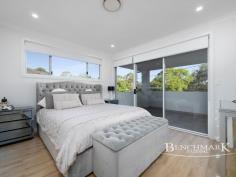  12A Anzac Mews Wattle Grove NSW 2173 Perfectly positioned in one of Wattle Groves most desirable pockets, this beautifully maintained dual-level home offers the ultimate in comfortable, low-maintenance family living. Built in 2019 and still presenting like new, the property has been further enhanced by the owners with the addition of a stylish sunroomadding extra space and versatility to an already impressive floorplan. Set within a quiet enclave close to local shops, lakeside walks, quality schools, and major roads connecting easily to greater Sydney, this home delivers both lifestyle and convenience in equal measure. Property Features: Four generous bedrooms with built-in wardrobes Master suite with walk-in robe, ensuite, and balcony access Spacious open-plan living and dining flowing into a new sunroom extension Gas kitchen with stone benchtops, stone splashback, stainless steel appliances & walk-in pantry Floor-to-ceiling tiled bathrooms plus additional downstairs powder room Formal front living room and welcoming entrance Tiled ground floor, with timber flooring upstairs throughout all bedrooms and hallway Ducted air conditioning, alarm system, video intercom, and ample storage throughout Internal access to remote garage plus off-street parking Wide dual side access and level sunny backyardperfect for kids and pets Fully tiled alfresco plus additional sunroom for year-round entertaining This is a rare opportunity to secure a near-new, turn-key home in a tightly held family-oriented community. Dont miss your chanceinspect today and fall in love with Wattle Grove living. 