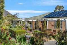  8B Melane Road Old Beach TAS 7017 $889,000 From a superb location at the end of a peaceful no-through road, this elevated acreage delivers spectacular vistas across the treetops to the Derwent River, majestic Kunanyi/Mount Wellington and beyond. This exceptional property is brimming with features, all of which are enriched by the surrounding environment where you can immerse yourself in nature as you explore untouched bushland abundant in native wildlife. Wander through the beautiful gardens of the fully fenced area around the home or just sit back and enjoy the birdsong in your own slice of Tasmania's stunning southern region. Drive through the electric gates to discover the perfectly oriented home, allowing the capture of sights and sounds of your surroundings at almost every turn. Step inside to a large and light filled living and dining area, each with easy access to your choice of outdoor spaces to gather with guests or simply relax. Create a feast to share in the well equipped kitchen, then move to either the garden terrace or huge deck to embrace those views you'll never tire of. Three bedrooms and two bathrooms also grace the layout here. Two bedrooms share the main bathroom with spa bath and separate shower and the master bedroom, with walk-in robe, is also complemented with an ensuite for added privacy. Designed with sustainability in mind, this property features solar panels, a grey water system, ceiling insulation, and a water tank, making it both eco-friendly and cost effective. Outdoors a powered double garage with remote controlled doors and ample hardstand with room for the van or boat takes care of vehicle accommodations. A community of welcoming neighbours and fabulous convenience go hand in hand here, where access to bus routes can be found at the end of the road and all retail options and essential services a short drive away. Both the airport and Hobart's bustling city centre are a 25 minute drive from home and when adventure beckons, all the natural beauty of the glorious Tasman Peninsula or the sweeping vistas of the gorgeous east coast are in easy reach. • Elevated acreage property in a tranquil pocket on Otago side of Old Beach • Peaceful no-through road with excellent neighbours • Fully fenced house yard with gorgeous gardens • Natural bushland with abundant birds and wildlife • Large, light filled living areas and well equipped kitchen • Expansive deck with stunning views • 7x6m powered garage with remote controlled doors plus hardstand for boat or van • Solar panels, greywater system, water tank, ceiling insulation • Wood heater, heat pumps, ceiling fans • Bus stop at the bottom of the road, close to major retail centres • 25 minute drive to the airport and Hobart's CBD 
